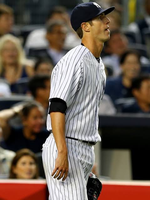 Shane Greene on the field in Yankees pinstripes